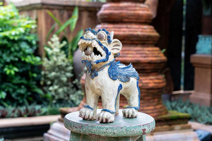 small ceramic singha lion statue