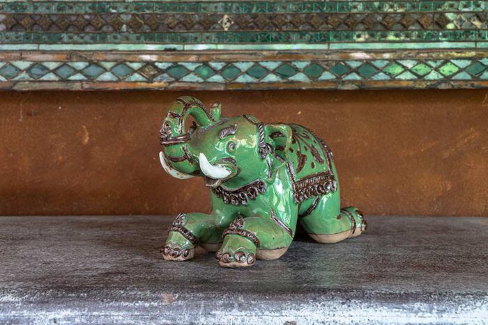 celadon kneeling elephant sculpture