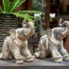 Thai Ceramic Kneeling Elephant Sculpture
